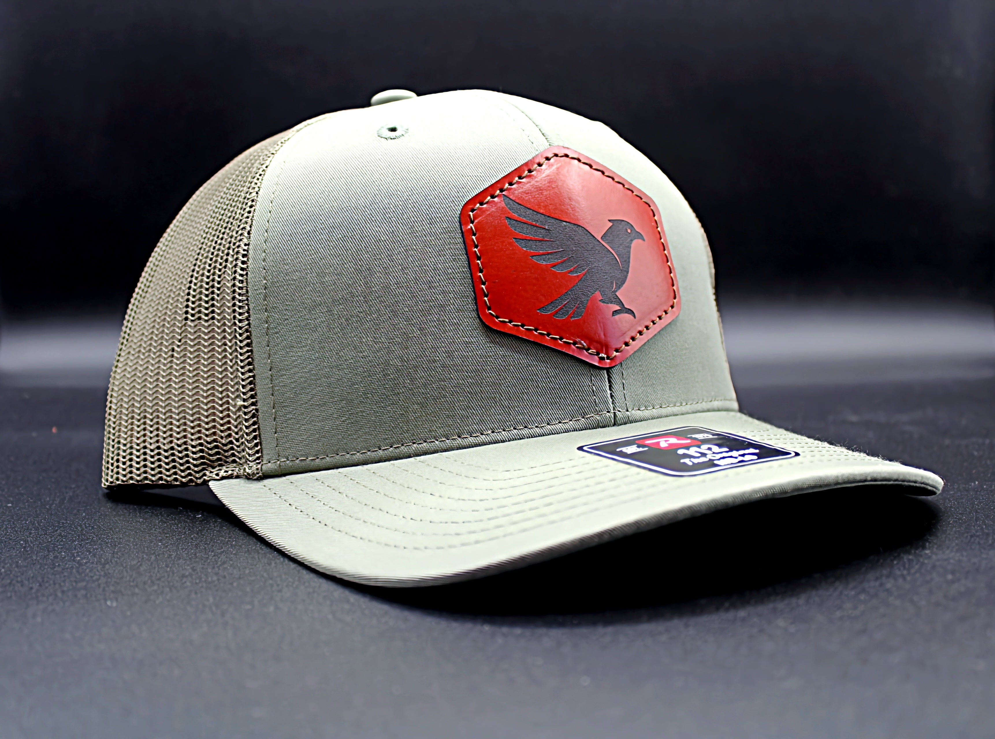 Falcon Leather Patch Trucker Hat